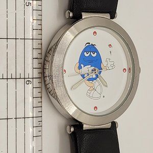 Blue M&M watch with genuine leather band. Collectible. From Jorg Gray Collection